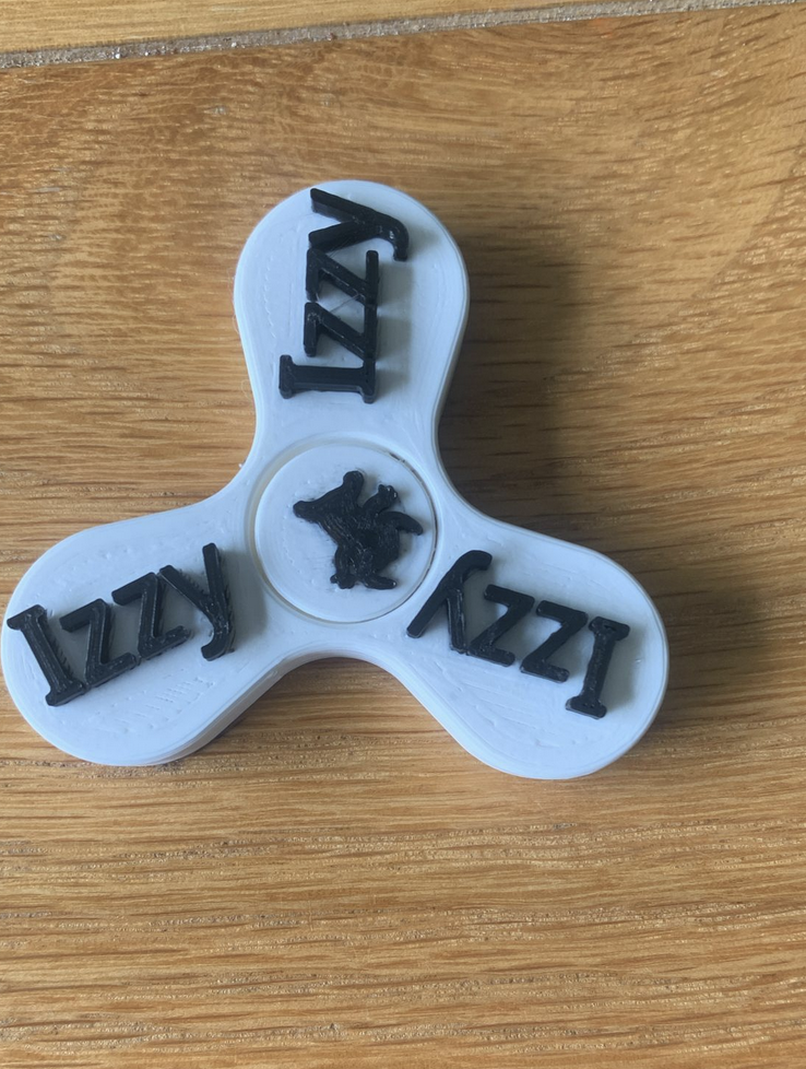A fidget spinner with Stitch on it