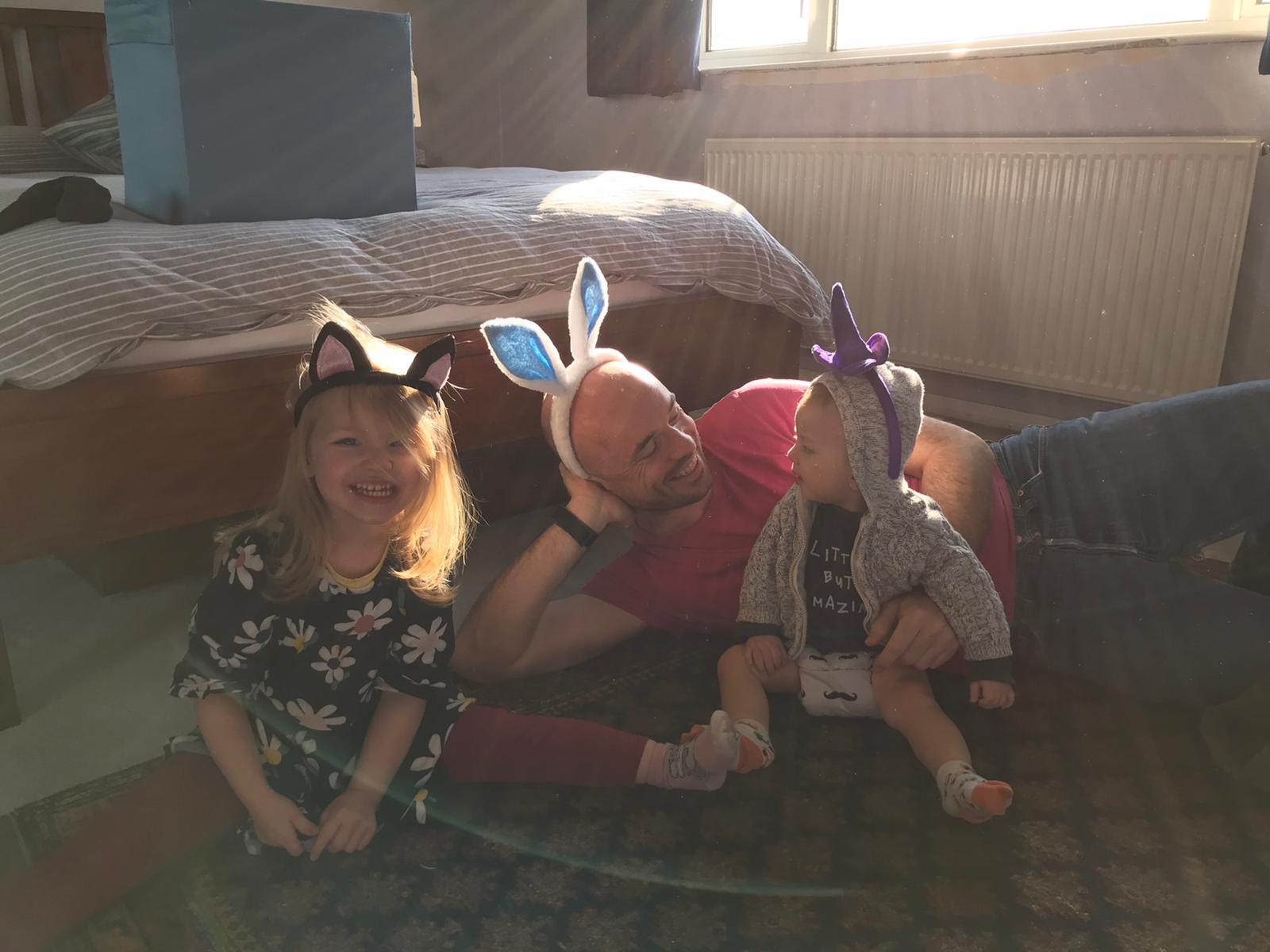 Photo of family wearing bunny ears